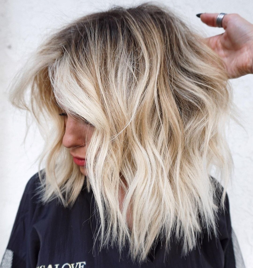 Blonde Choppy Medium Length Haircut
