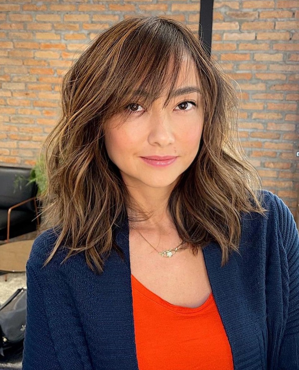 Shoulder-Length Hair with Bangs for Round Faces