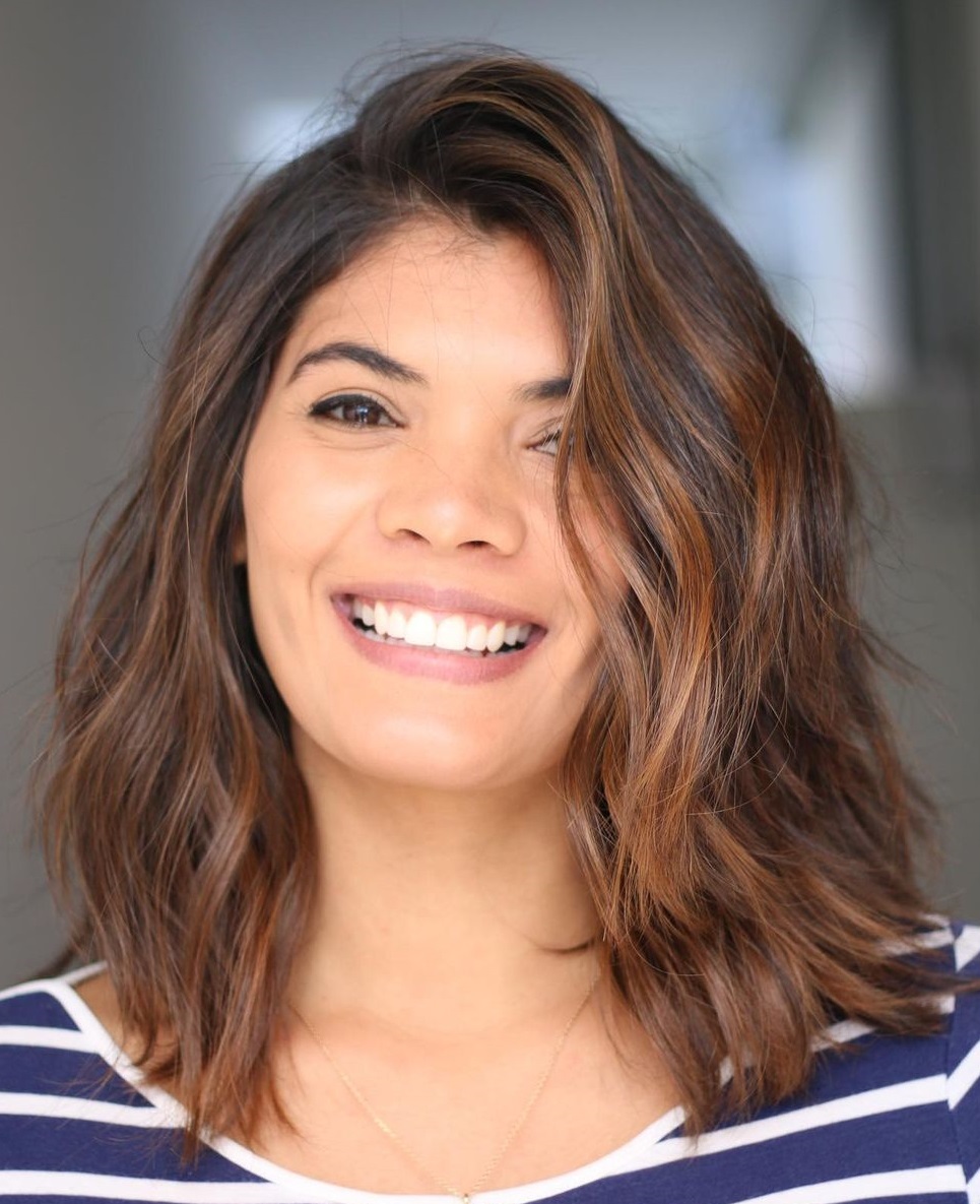 Medium Female Haircut for Wavy Hair