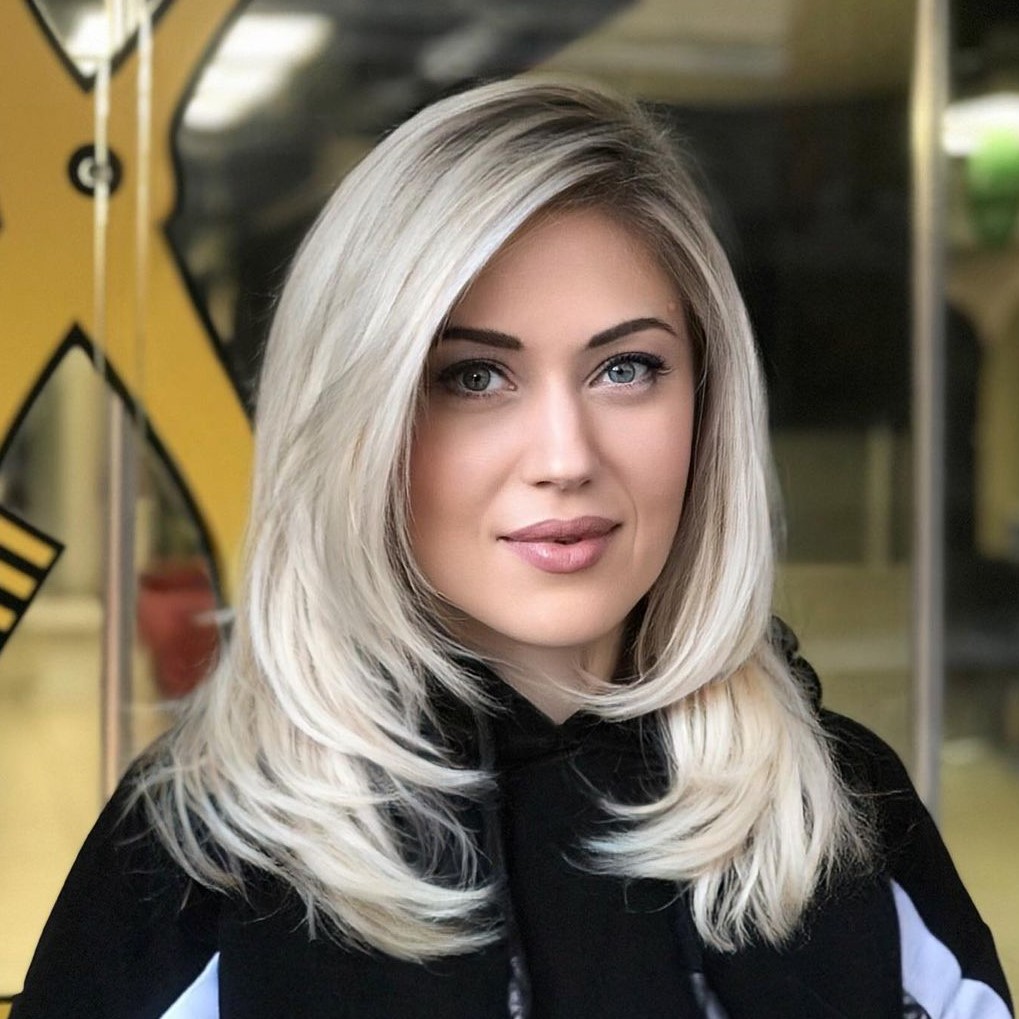 Mid-Length Hair with Feathered Layers