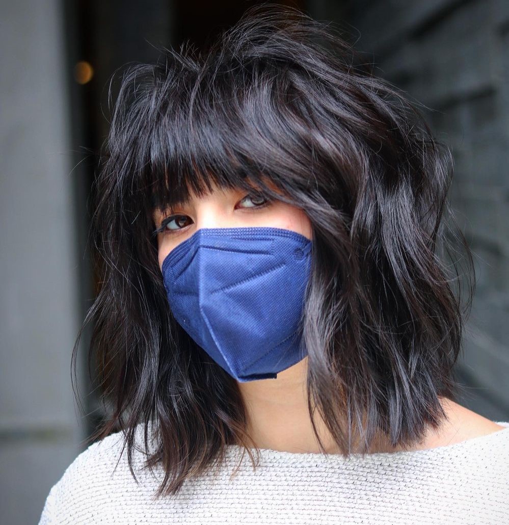 Medium Hair with Shaggy Layers and Bangs