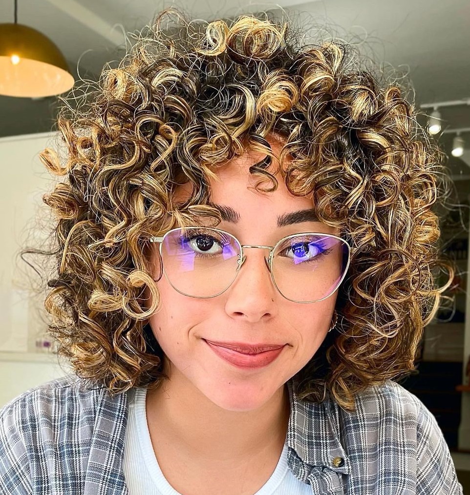 Medium Curly Rezo Cut with Bangs and Highlights
