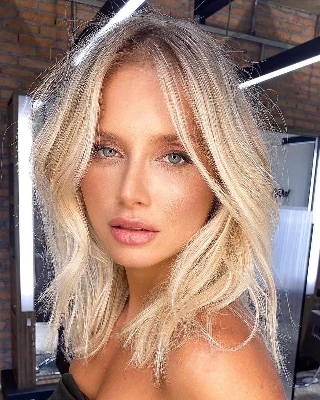 Midi Cut with a Middle Part for a Large Forehead