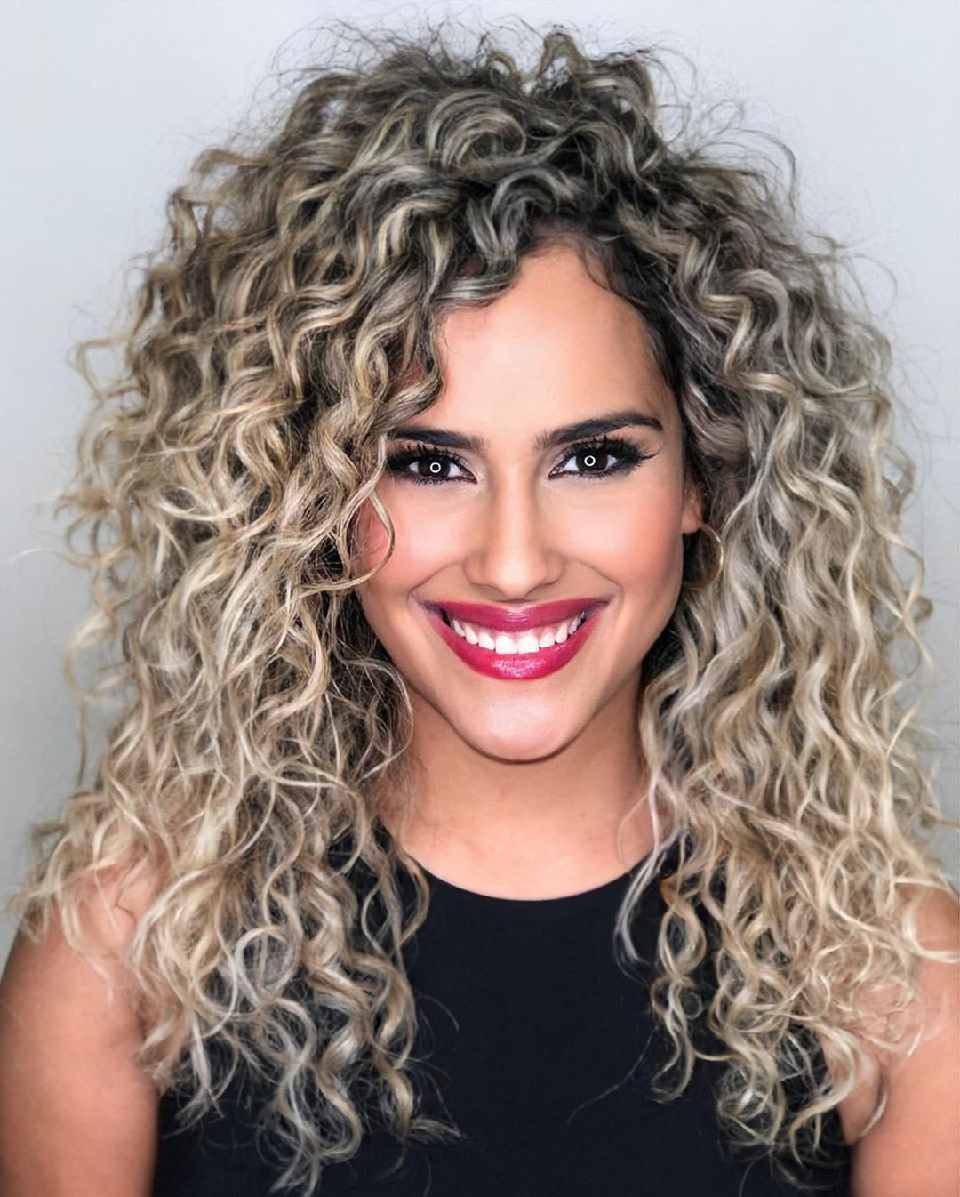 Long Blonde Rezo Cut with Dark Roots