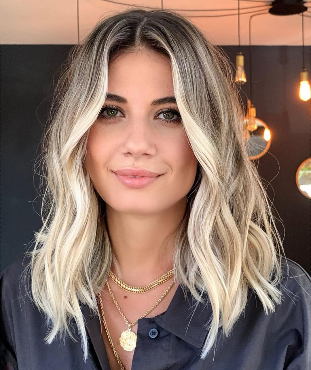 Wavy Blonde Balayage Hairstyle for Square Faces